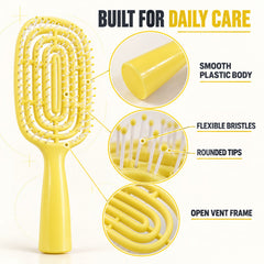 A yellow detangling brush with callouts for its smooth plastic body, flexible bristles, rounded tips, and open vent frame.