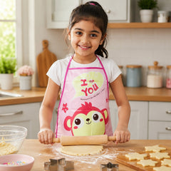 Child wearing the apron while cooking