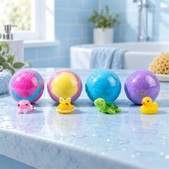 Four colorful bath bombs with small plastic toys, including an octopus, fox, turtle, and duck, on a wet bathroom counter.