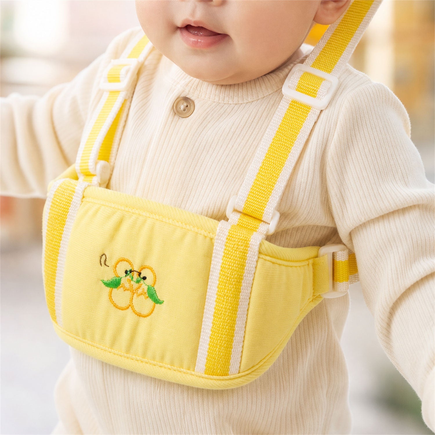 Front view of baby walking harness highlighting breathable cotton fabric