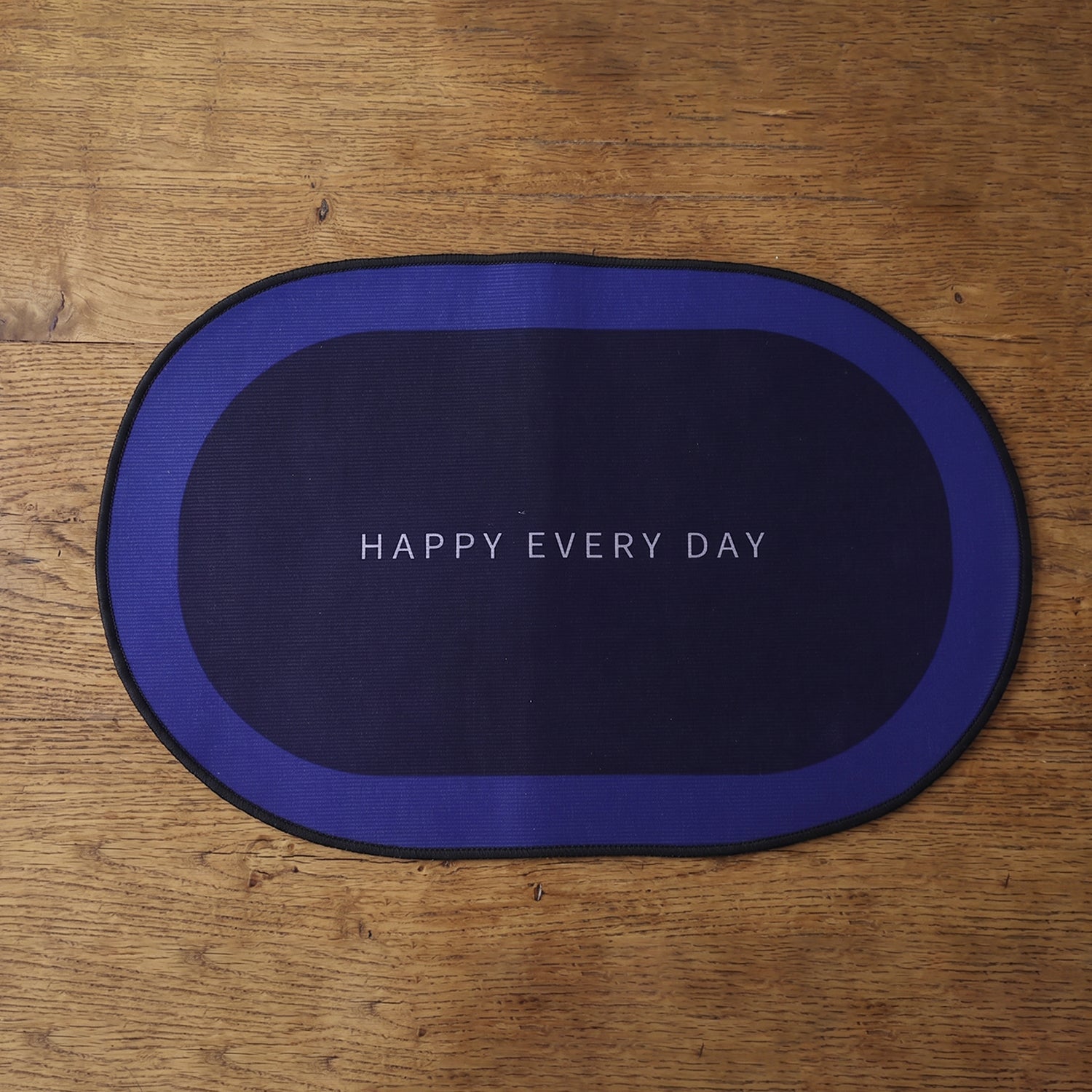 Multiple bathroom mats stacked, showcasing durability and easy cleaning