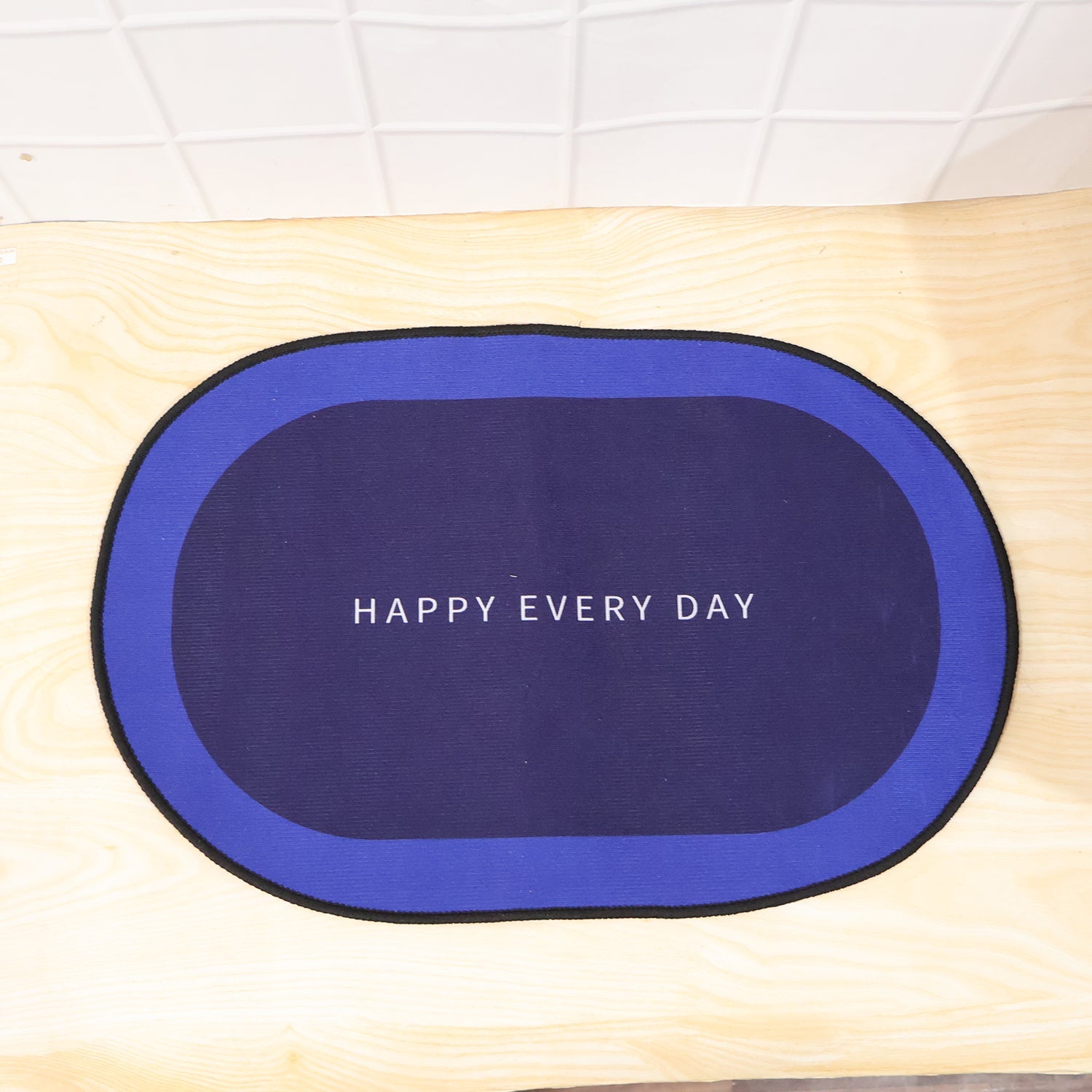 Bathroom entry with blue non-slip absorbent floor mat
