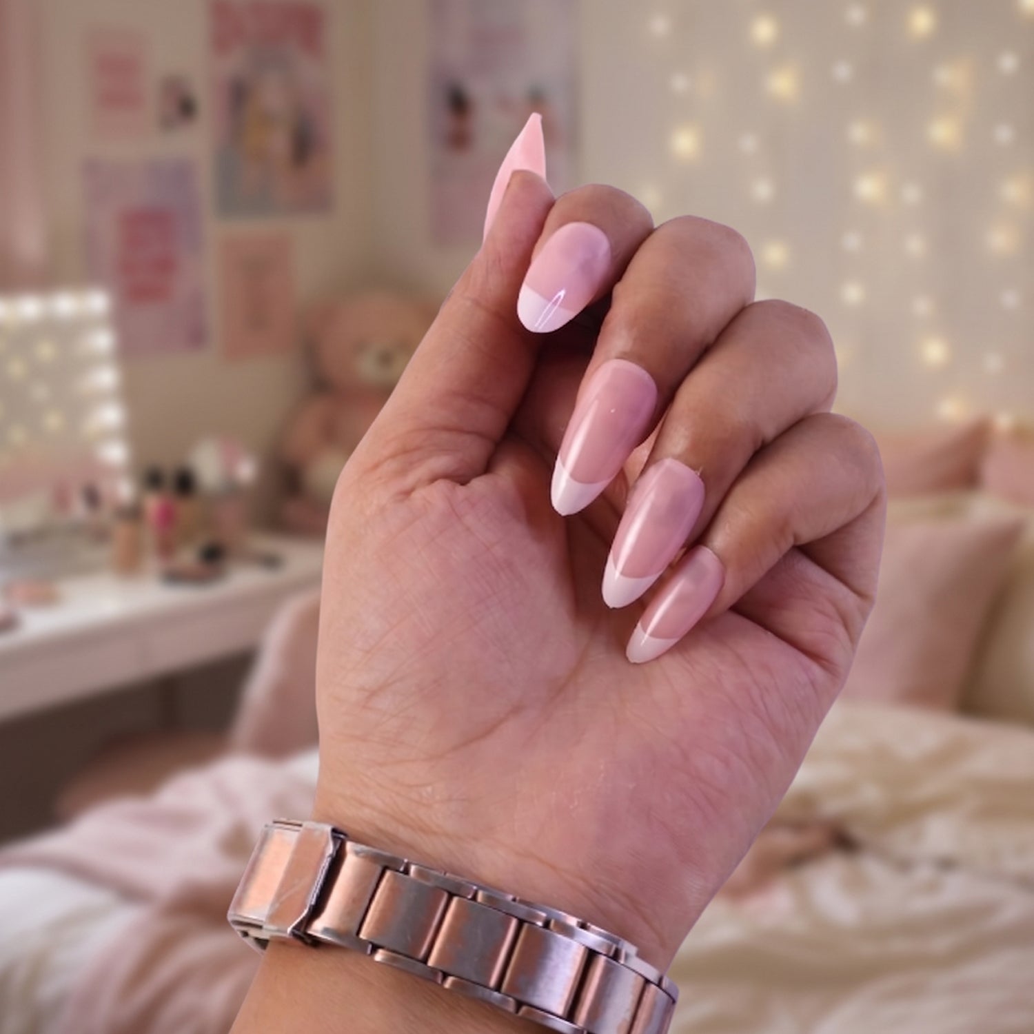 Glossy nude pink press-on false nails ready to wear