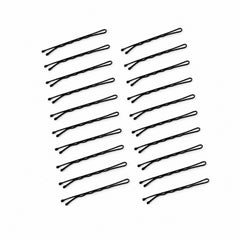 Twenty black metal bobby pins with rounded tips are neatly arranged in two columns on a white surface.