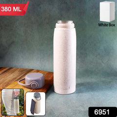 Glass water bottle side angle with phone holder