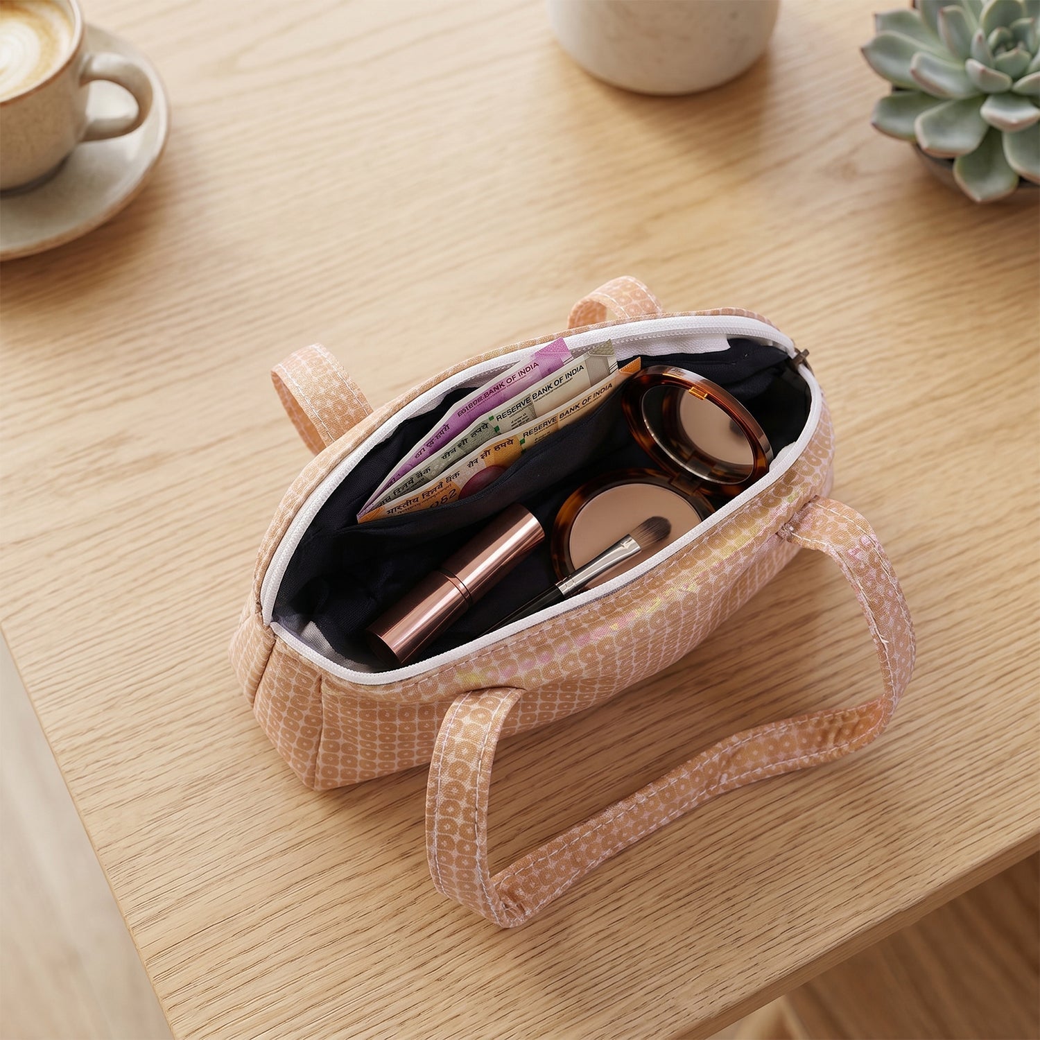 Stylish small handbag with printed faux-leather finish