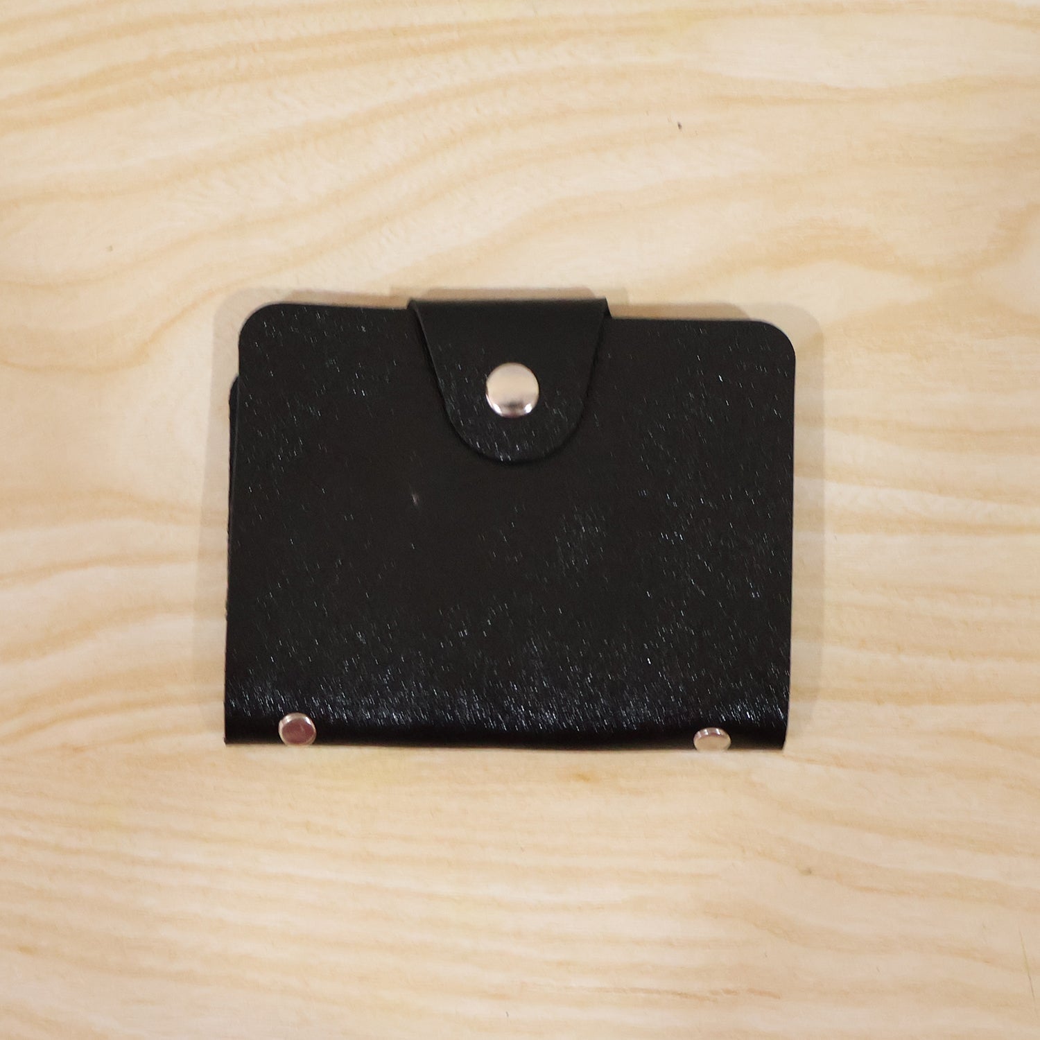 Detailed view of the transparent card sleeves in the wallet.