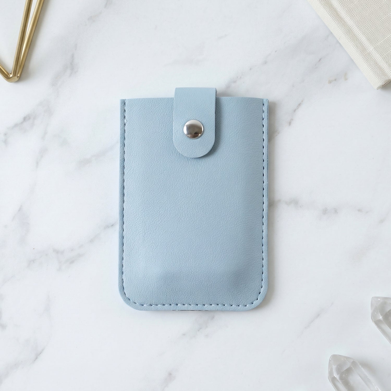 Cards fanning out from the pull out card holder