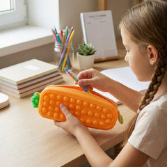 Open Pop It silicone pencil pouch holding pens & pencils