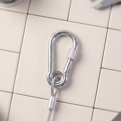Weatherproof steel wire clothesline in an outdoor garden setting, ideal for drying clothes.