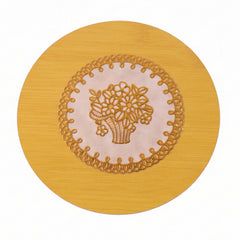 Stylish wooden coaster placed under a hot mug on a table.