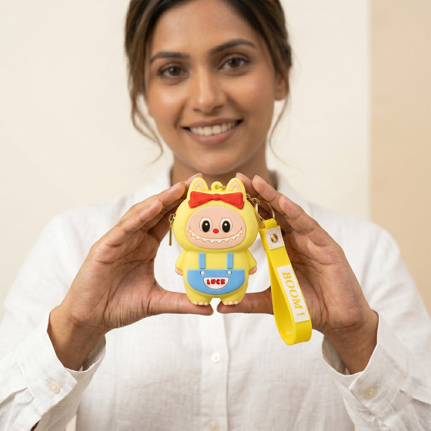Fun yellow character coin purse, versatile as a bag charm or key holder