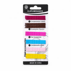 A white background displays a package of colorful bobby pins, including purple, brown, hot pink, blue, light pink, and