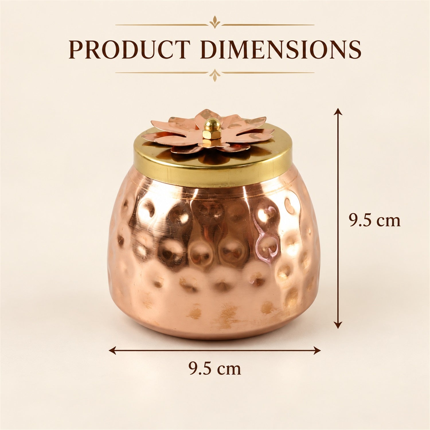 A hammered copper jar with a gold and copper flower lid is shown with arrows indicating its height and width are both 9.5 cm.