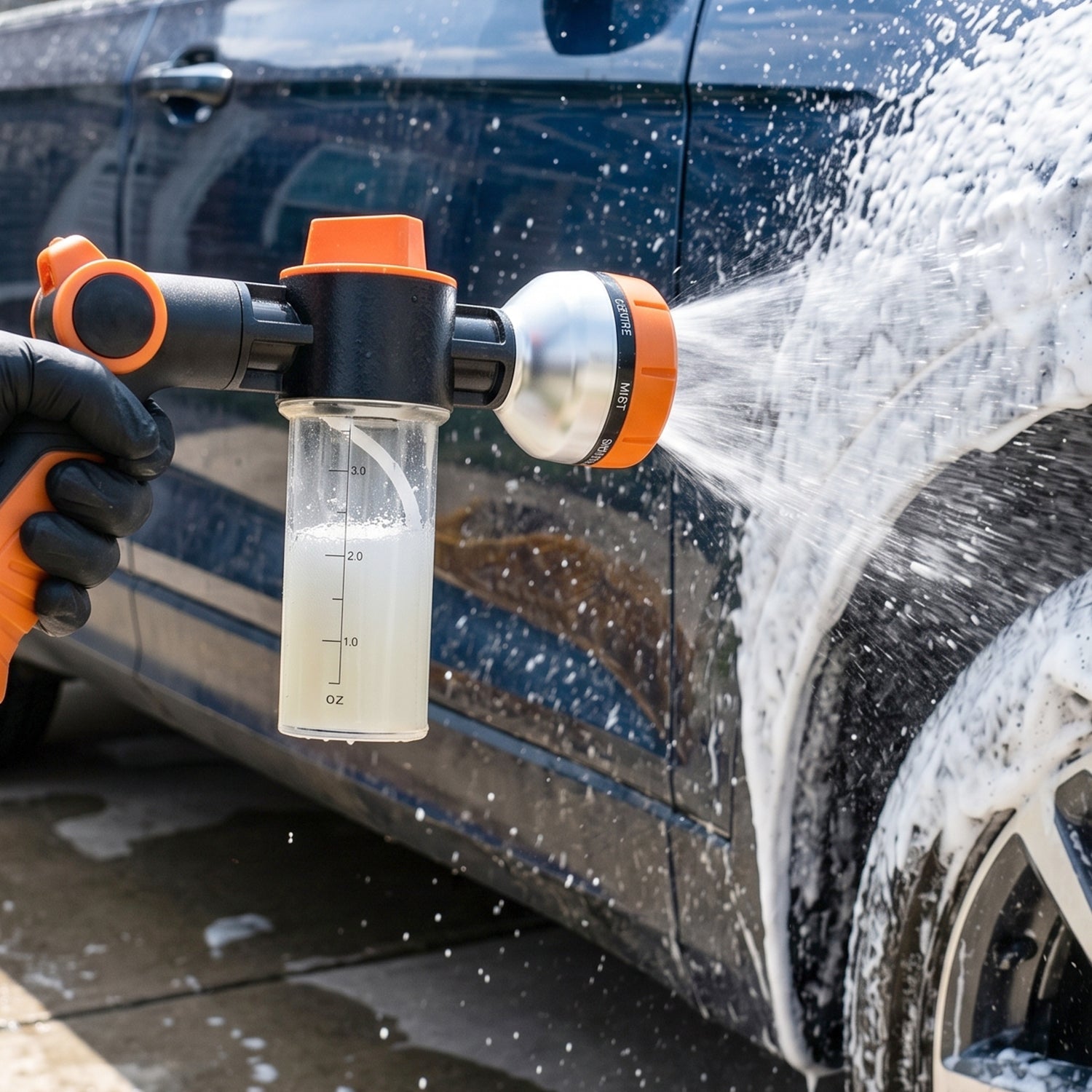 Multi-pattern water gun connected to a garden hose for versatile outdoor cleaning.