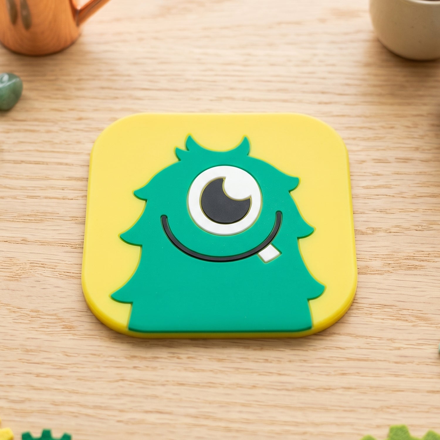 Stylish silicone coasters with monster design, easy to clean.
