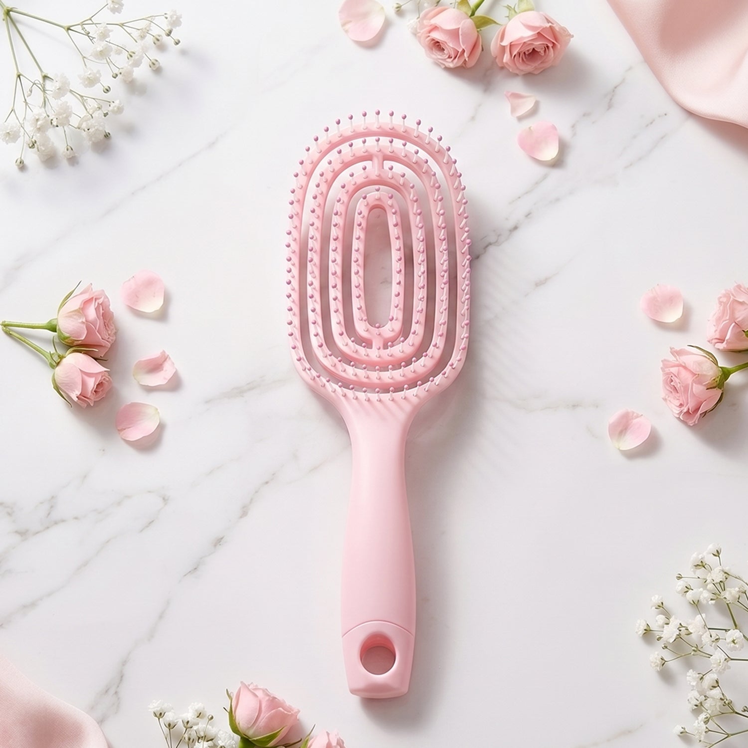 Side view of ergonomic design of curved detangling hair brush