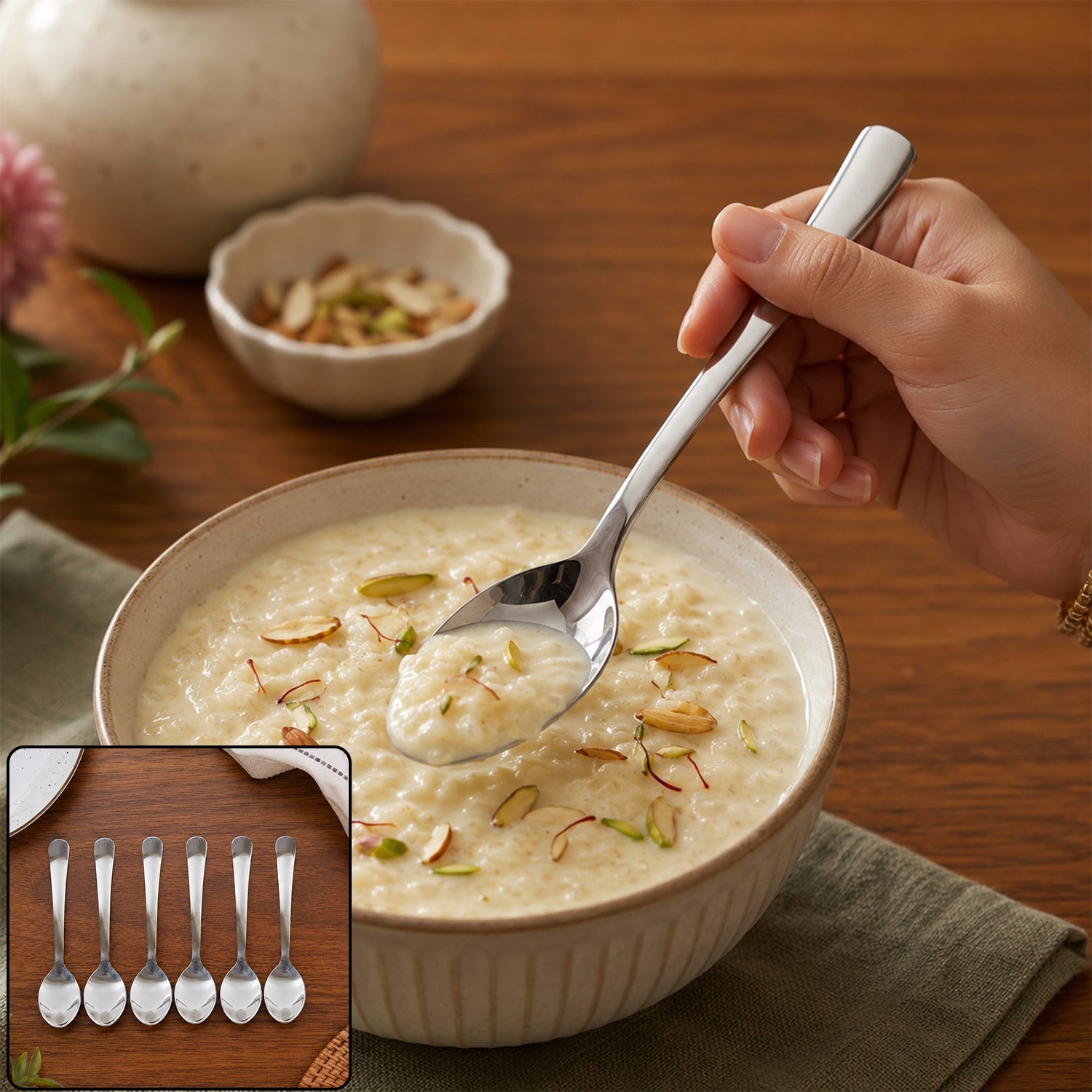 Six tea spoons laid out in a row