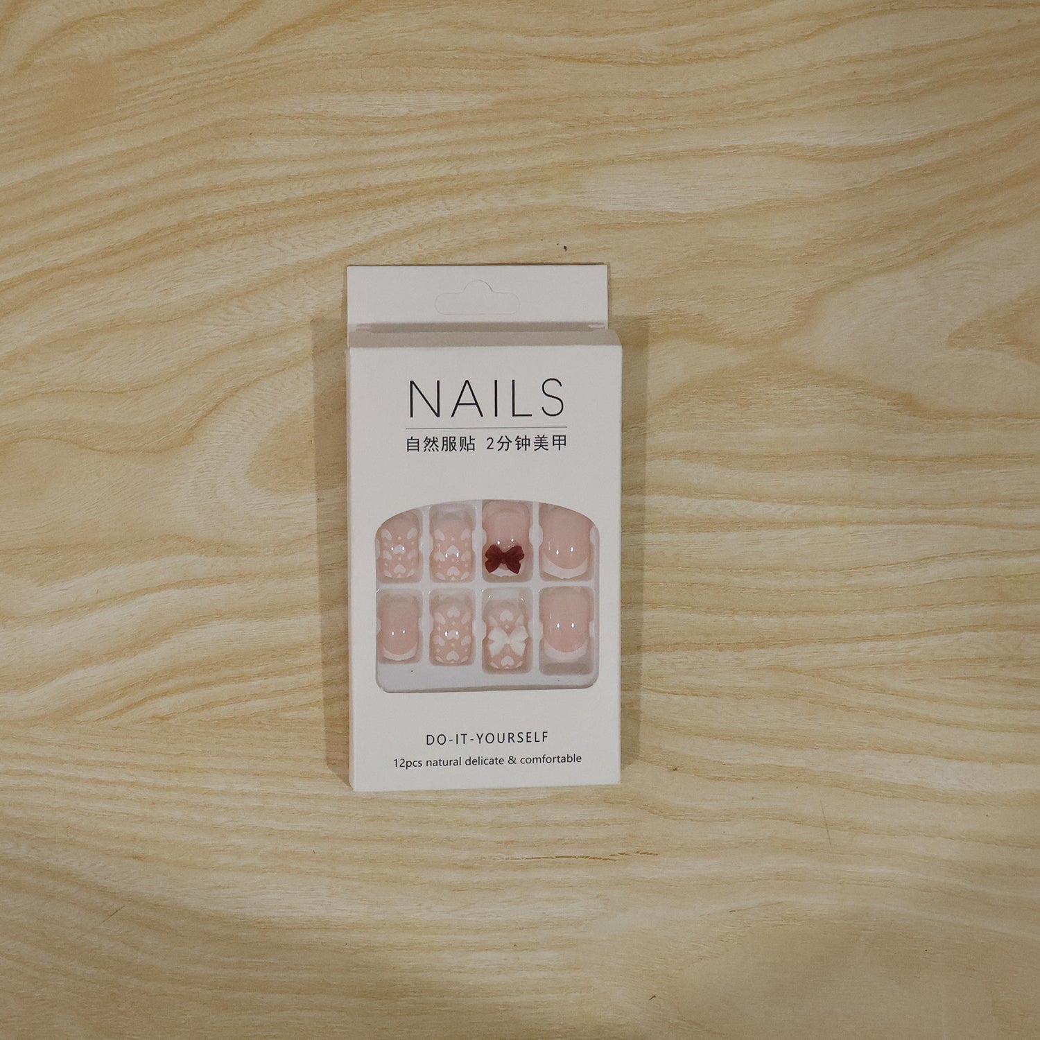 A model's hand wearing the glamorous glitter 3D floral press-on nail tips, ready for a special occasion.