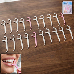 Dental floss picks arranged on a white background, showcasing their hygienic design