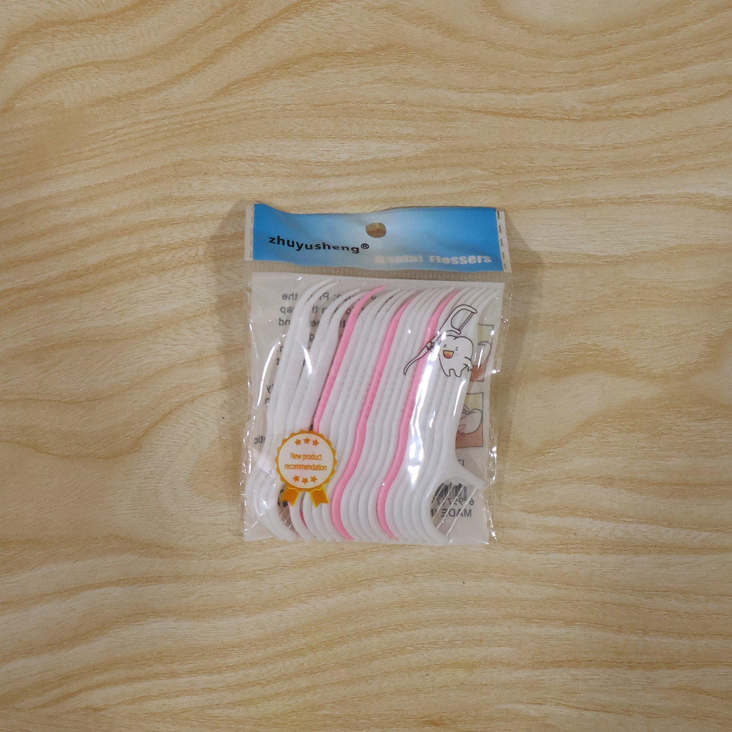 Multiple floss picks displayed for effective teeth cleaning