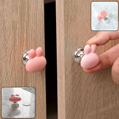 Cute bunny ear cabinet door knob on wooden cabinet