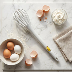 Kitchen hand whisk with comfortable long handle, suitable for daily cooking tasks.