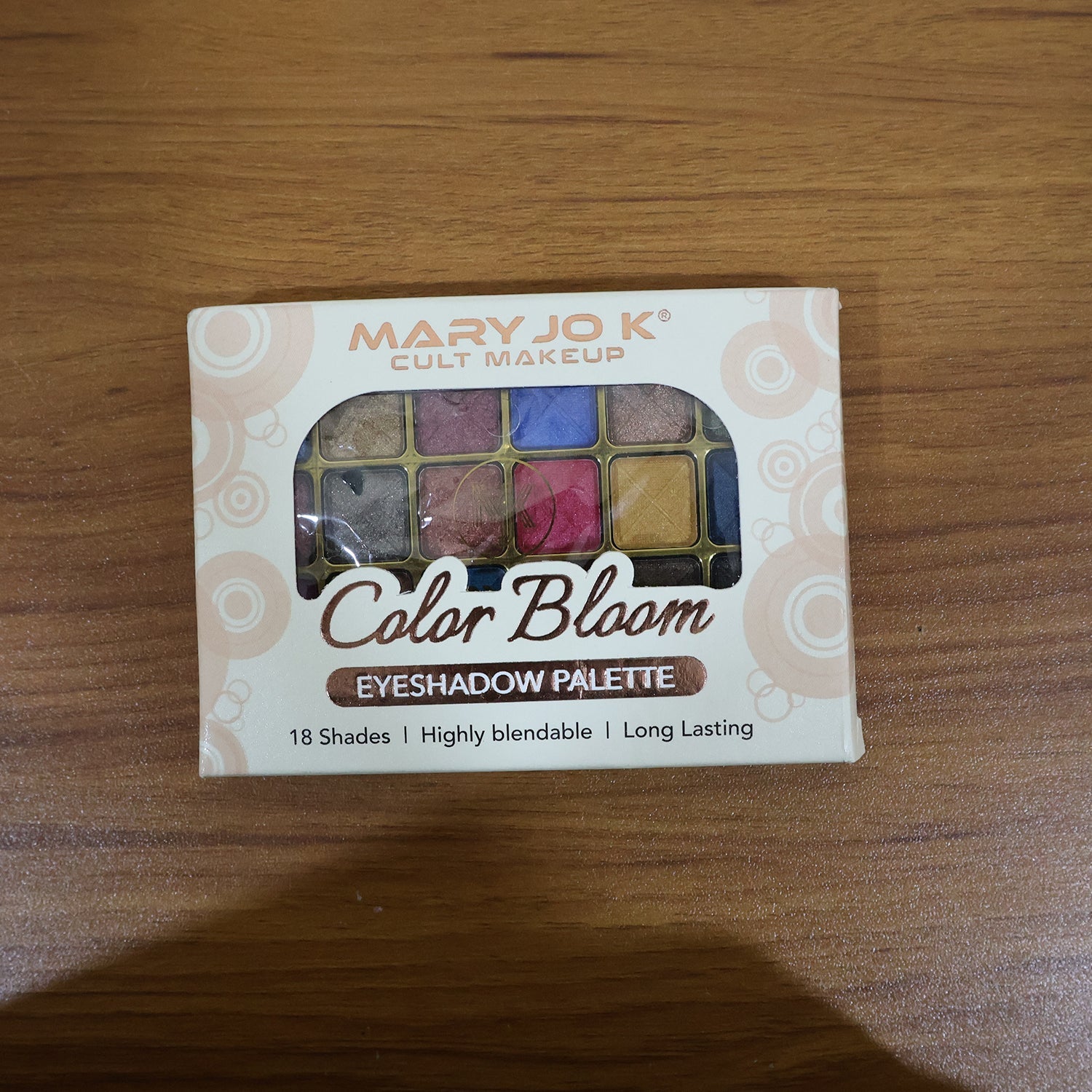 Model showing eye makeup created with shimmer eyeshadow palette