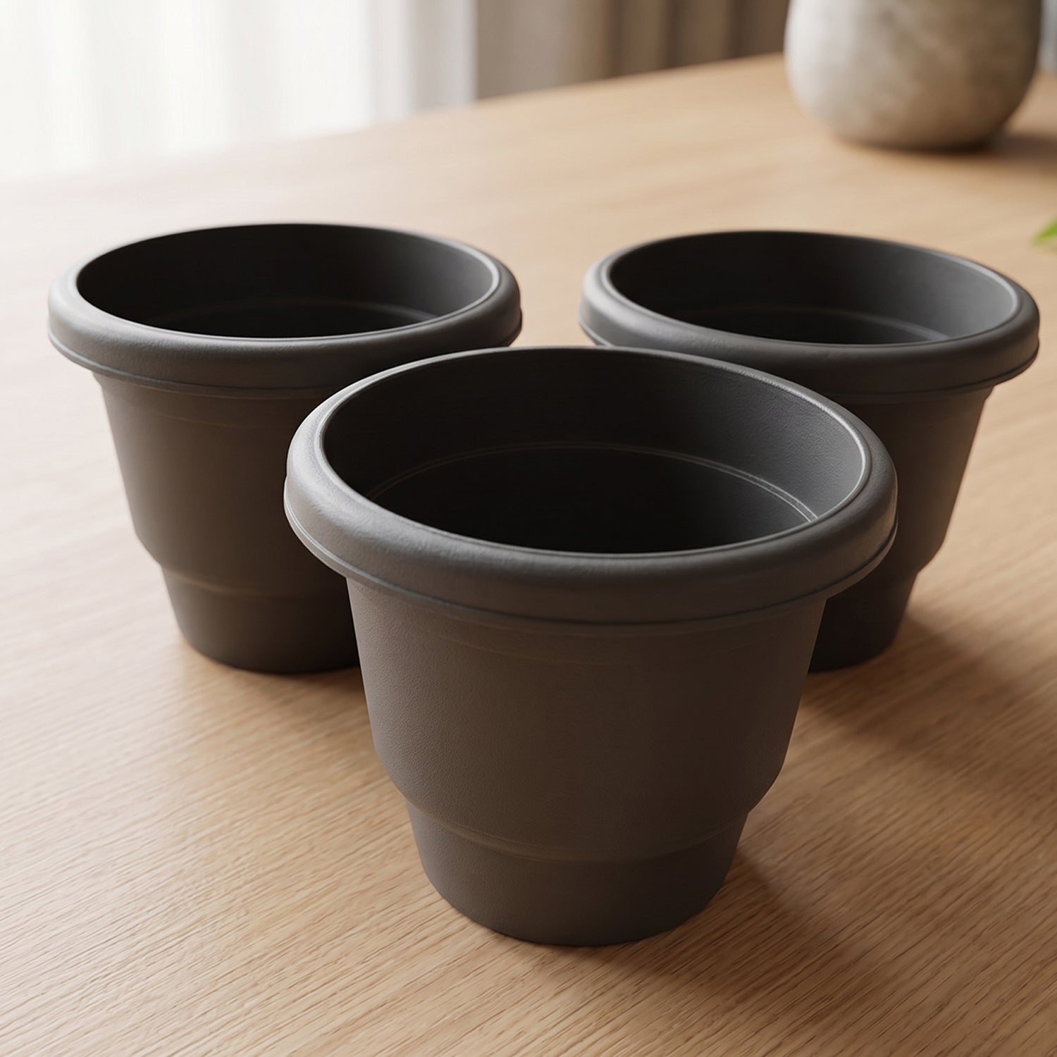Close-up of plastic flower pot set for gardening enthusiasts