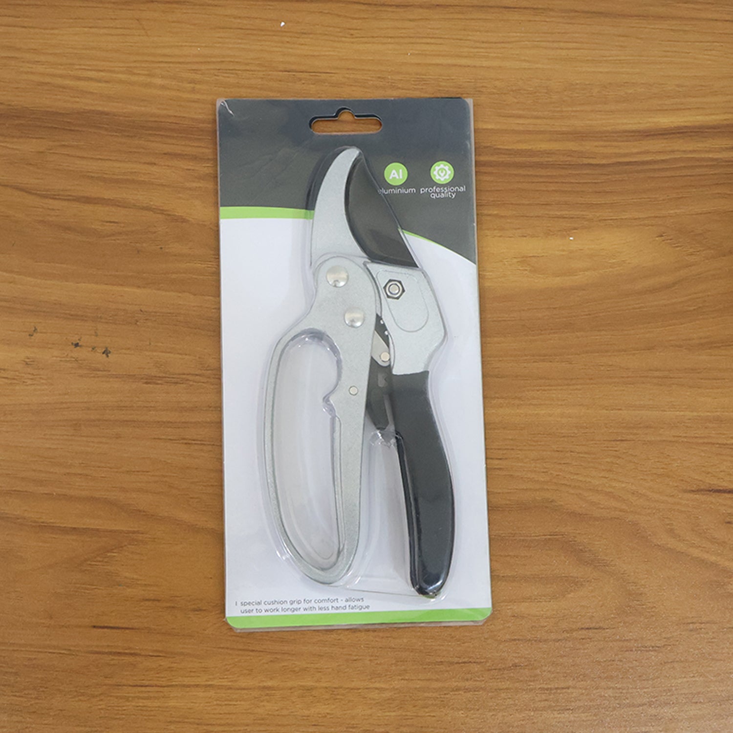 Gardening pruning shears displayed with foliage
