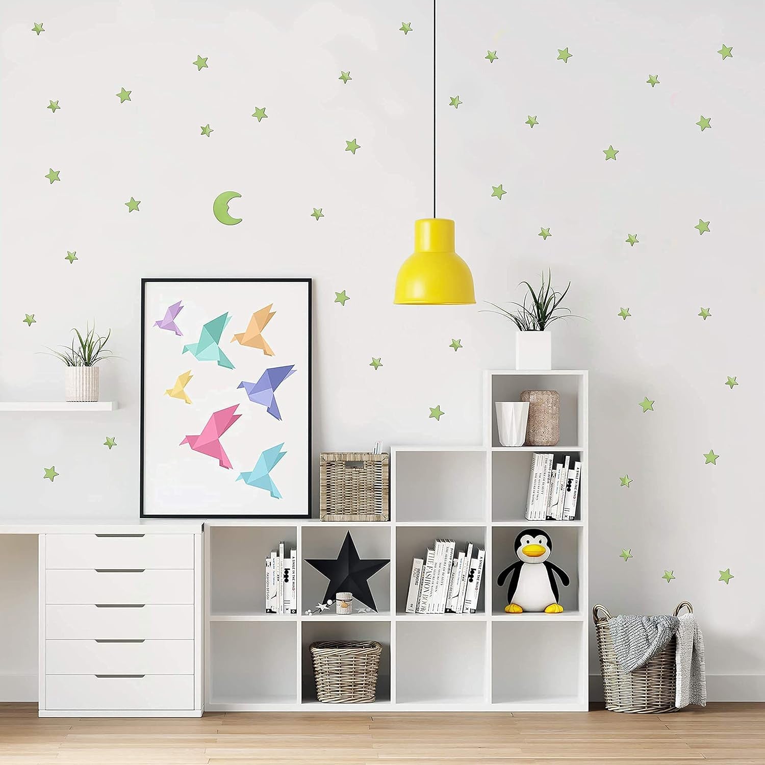 Fluorescent star and moon stickers glowing at night