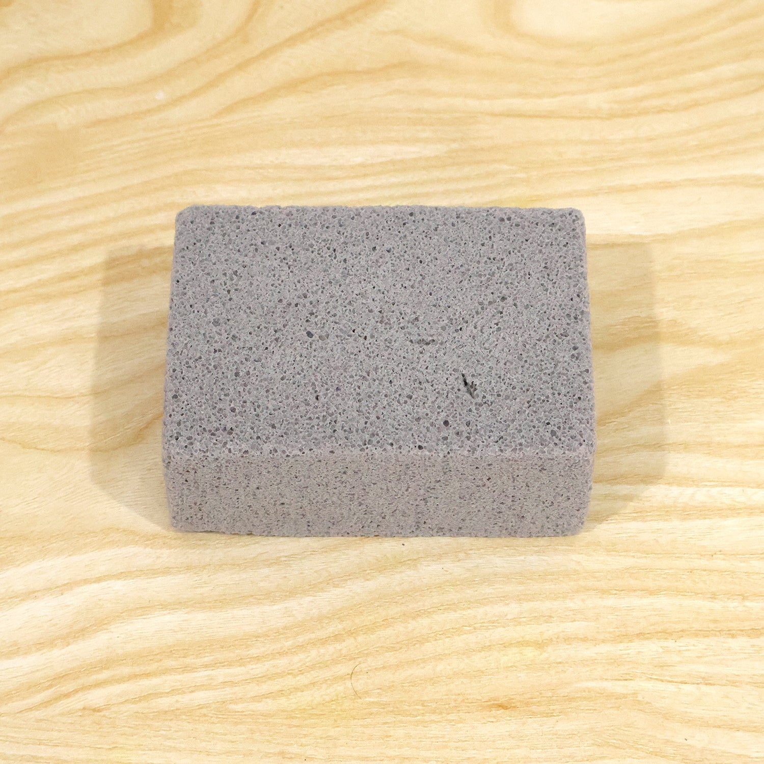 Live photo of grill stone cleaning block