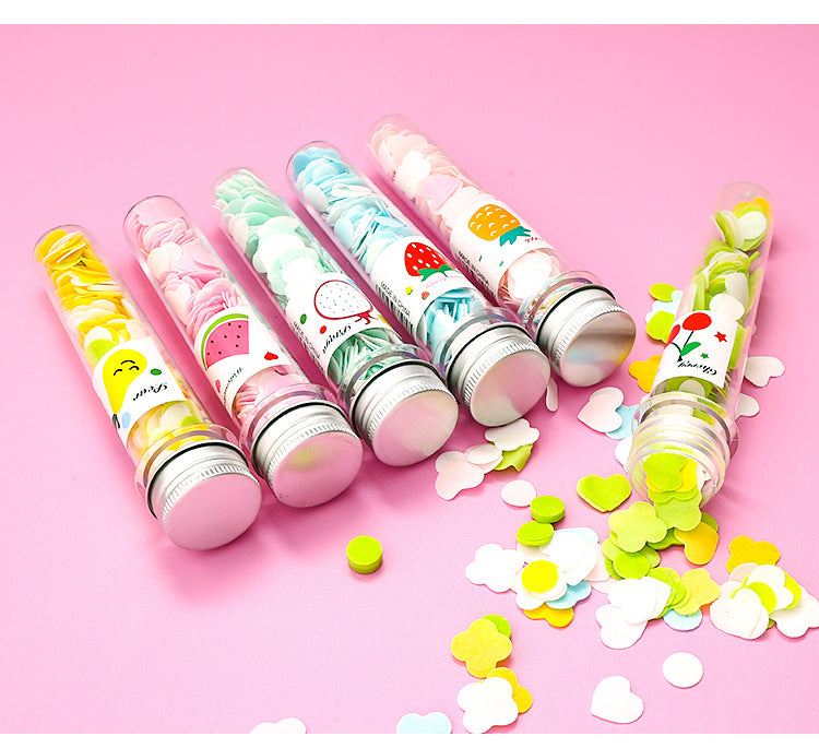 Assorted color flower soap strips in transparent test tube
