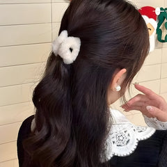 Hair claw clip holding hair in elegant style