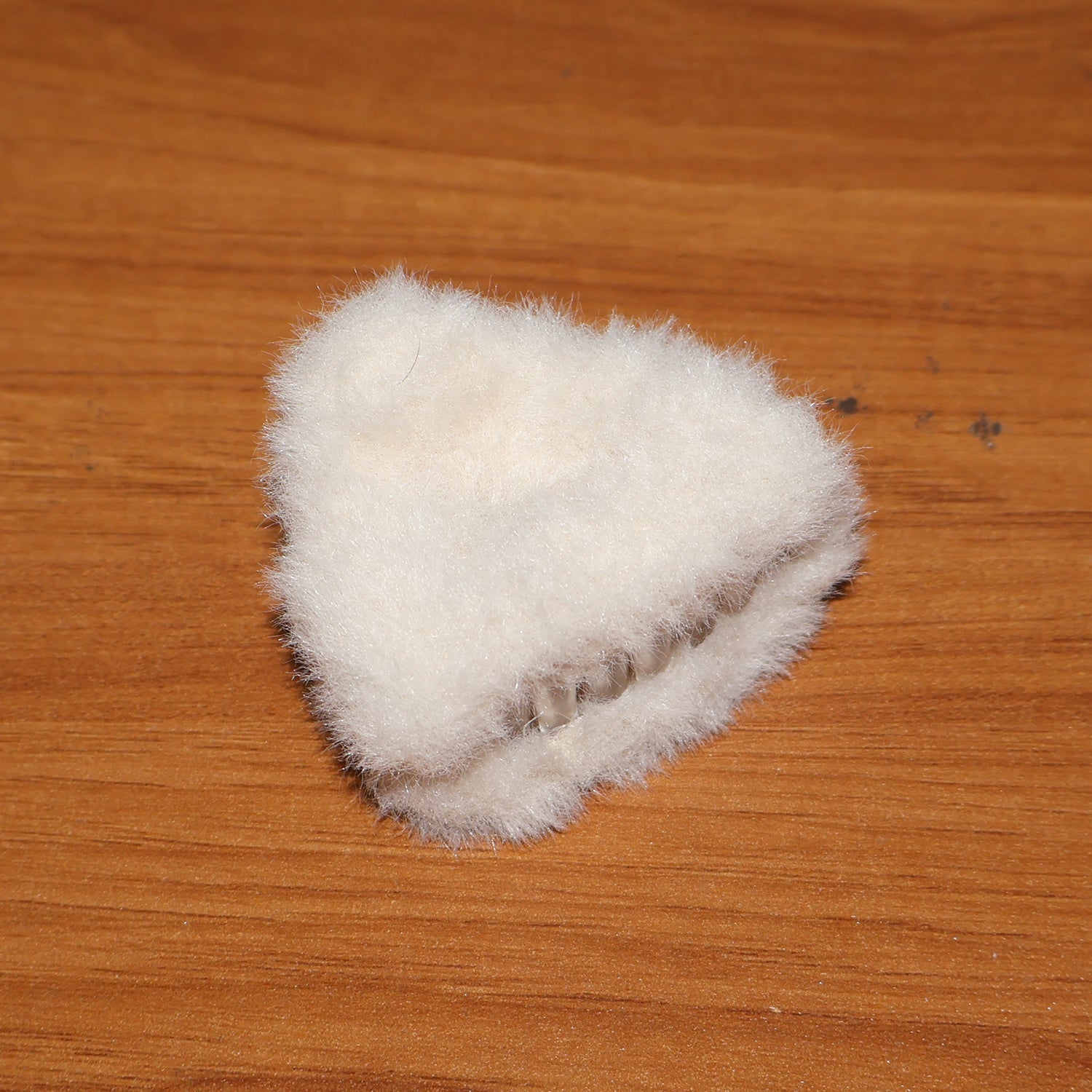 Hair claw clip demonstrating firm hold on thick hair