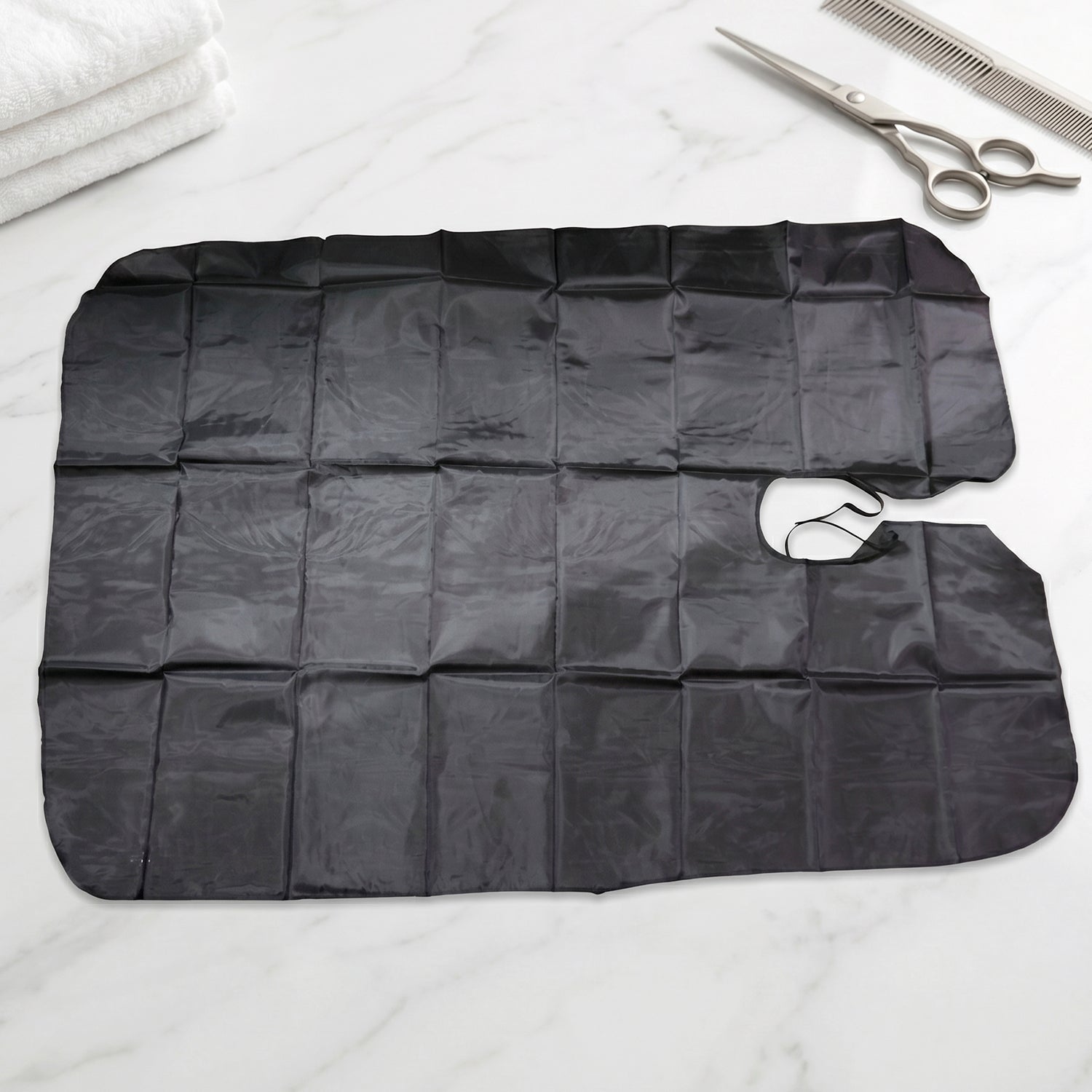 Professional hair cutting apron cape hanging