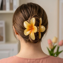 Flower hair clip holding styled hair in place
