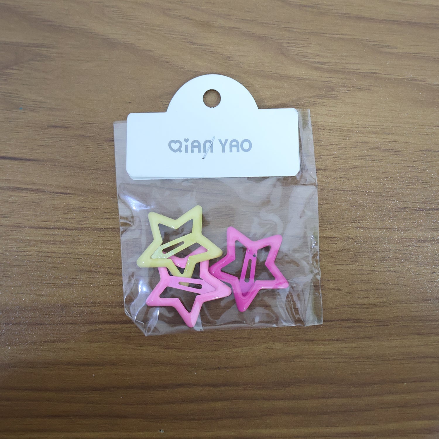 Star hair clips styled on a girlâ€™s braided hairstyle