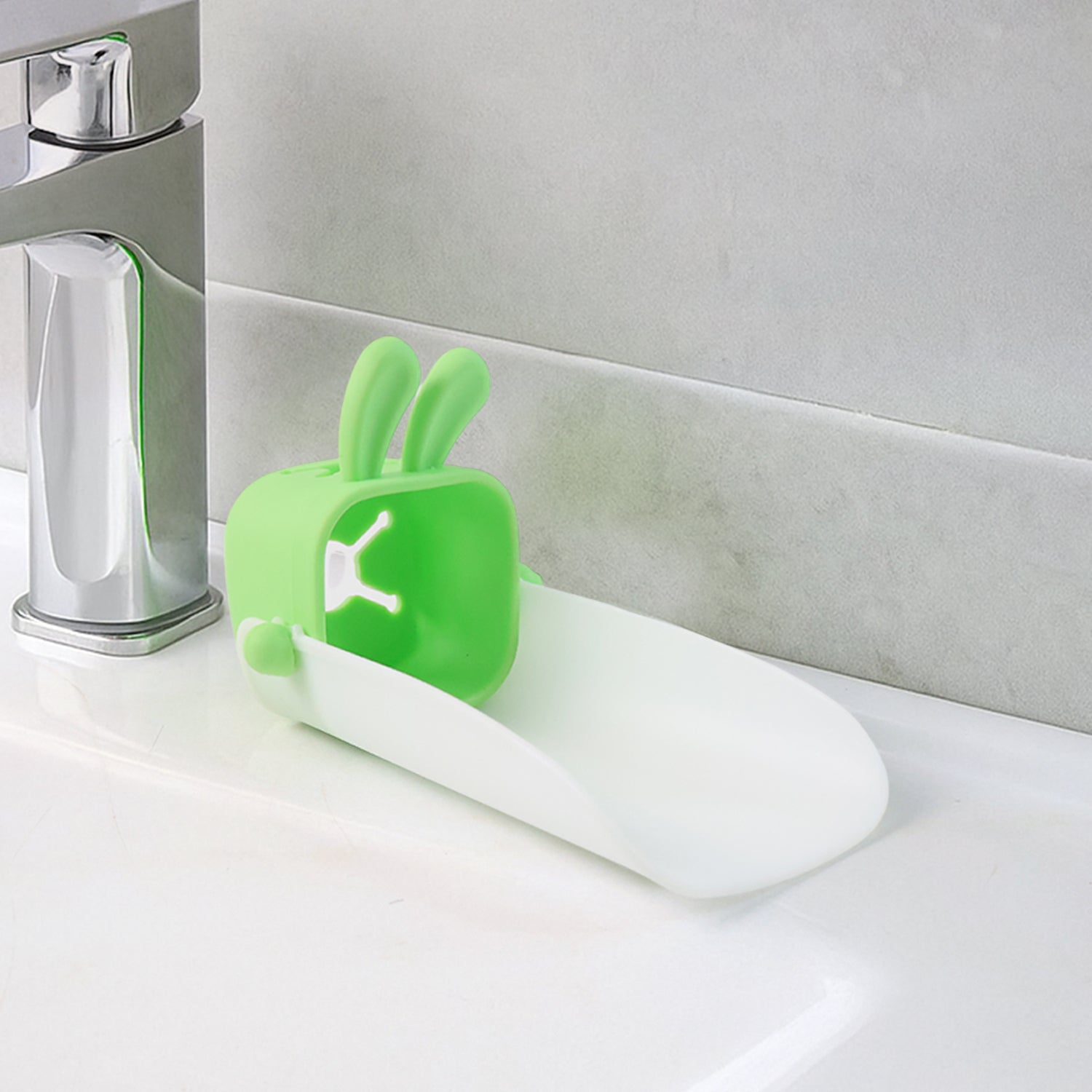 Silicone faucet handle extender showing soft and flexible material
