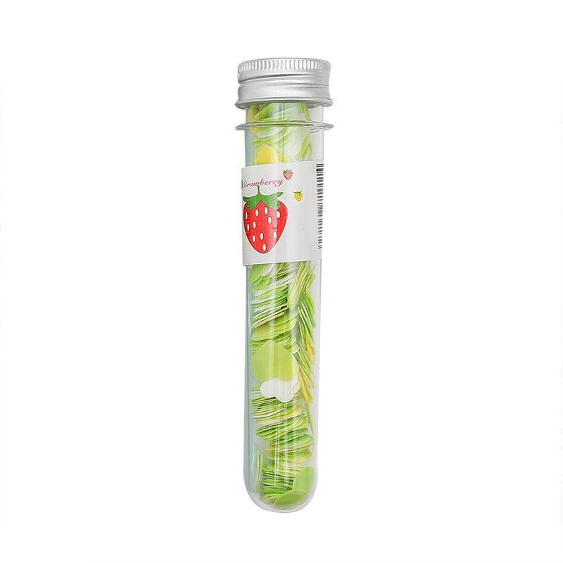 Test tube bottle filled with colorful flower soap strips
