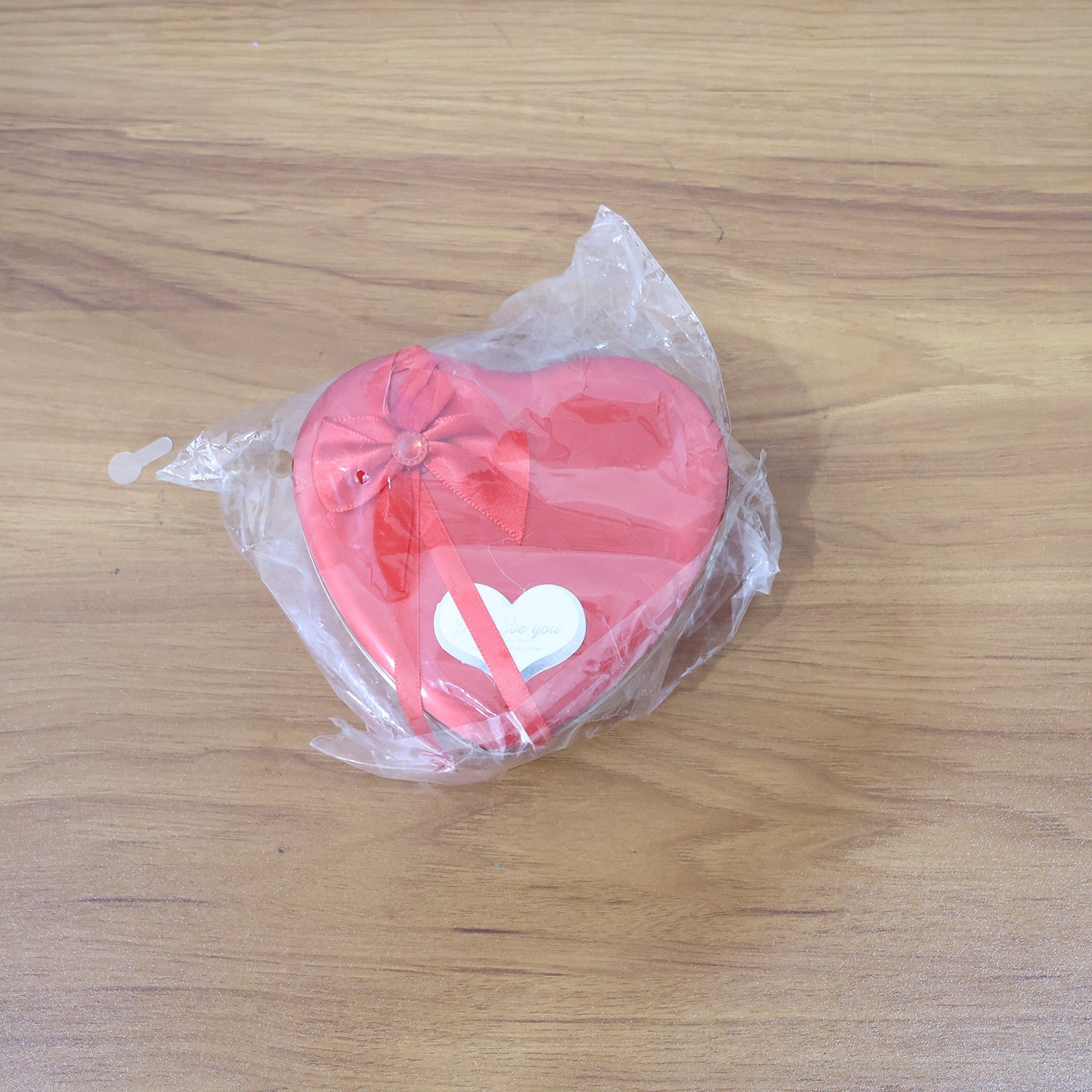 Heart shaped gift box product live shot with teddy bear and roses