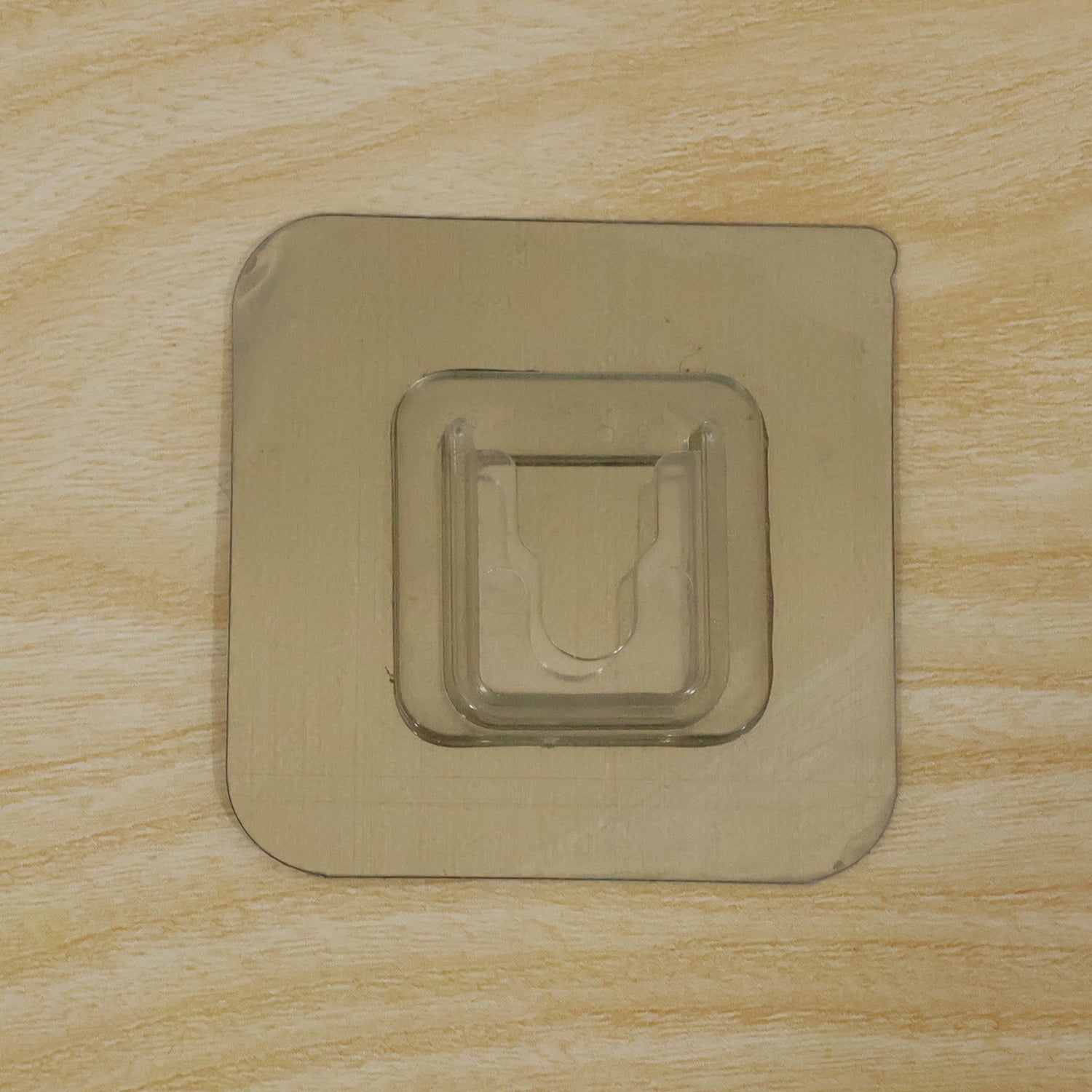 Transparent waterproof wall hook holding various household items