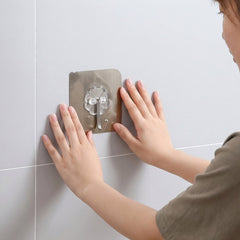 Self-Stick Metal Floral Design Wall Hook in use