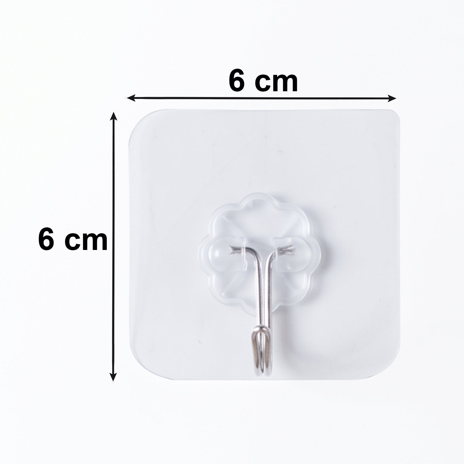 Clear adhesive flower-shaped wall hook installed on wall