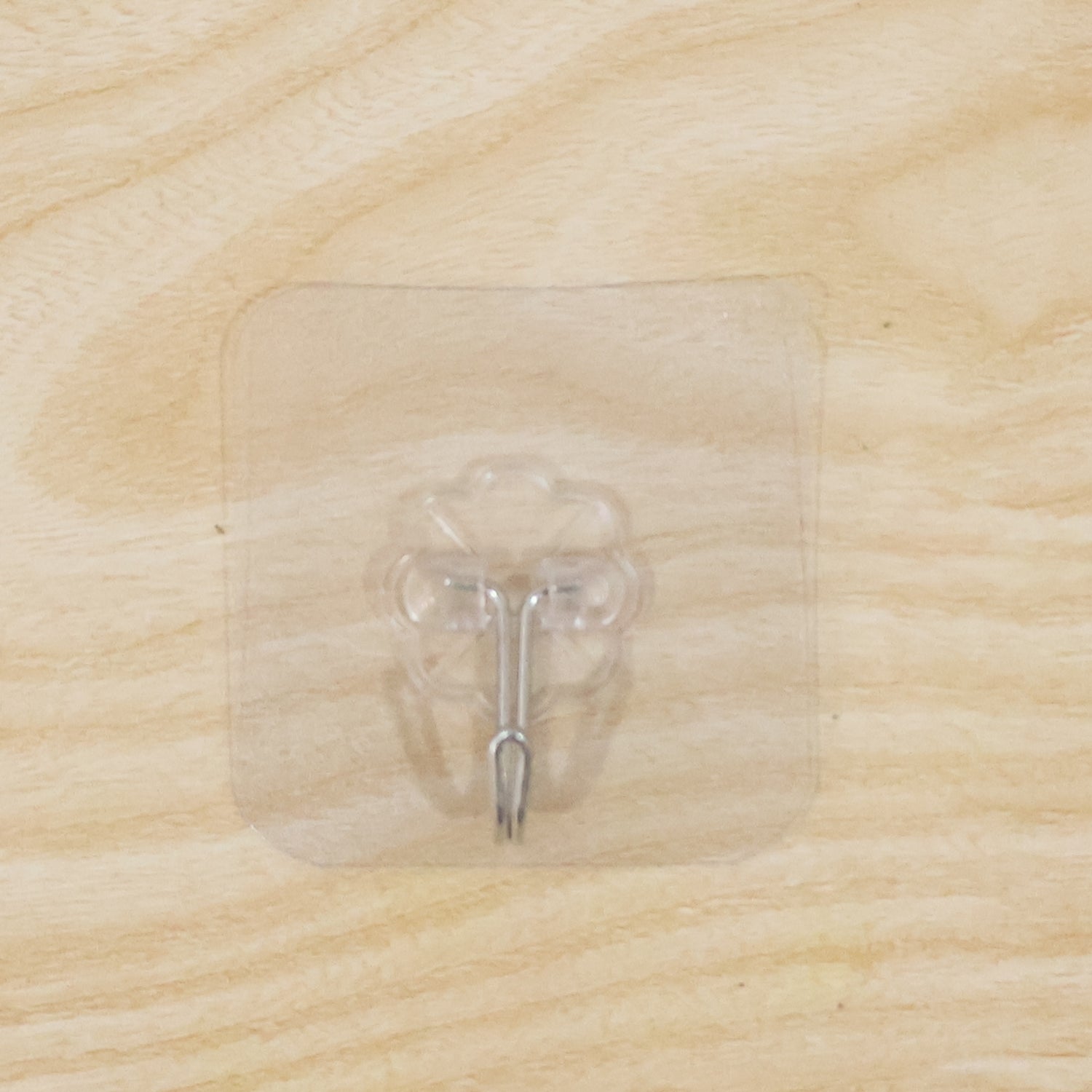 Close-up of clear flower self-adhesive wall hook