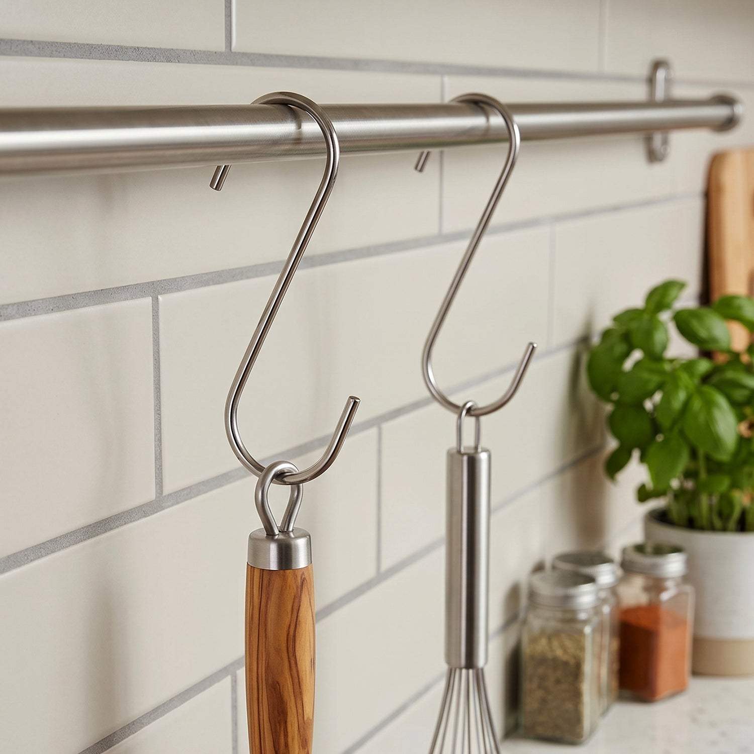 Garage or garden setup with multiple metal hooks for tools.