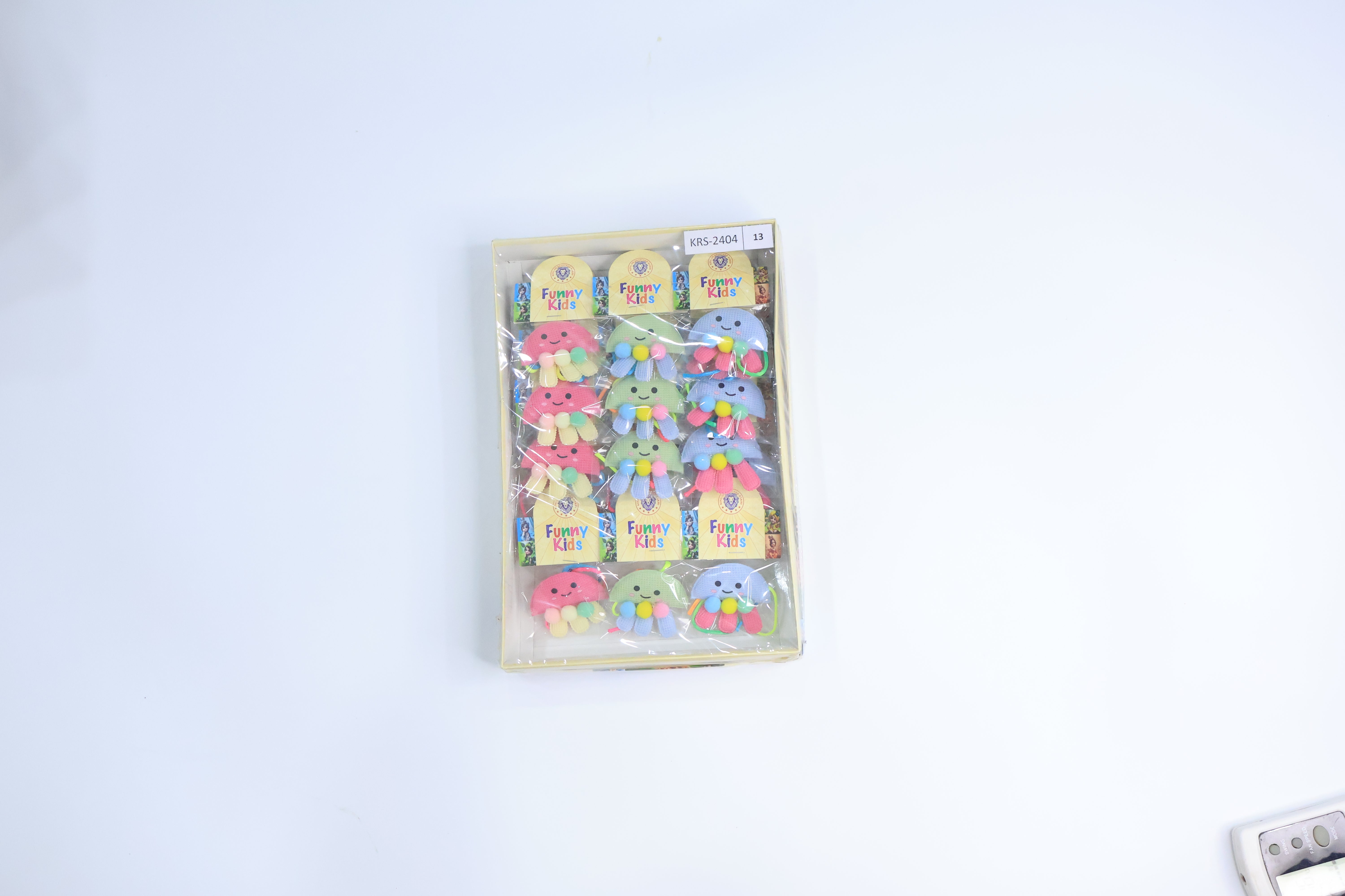 12 Pc Jellyfish Kids Rakhi Set â€“ Adorable Soft Fabric Design with Pom-Poms and Neon Thread