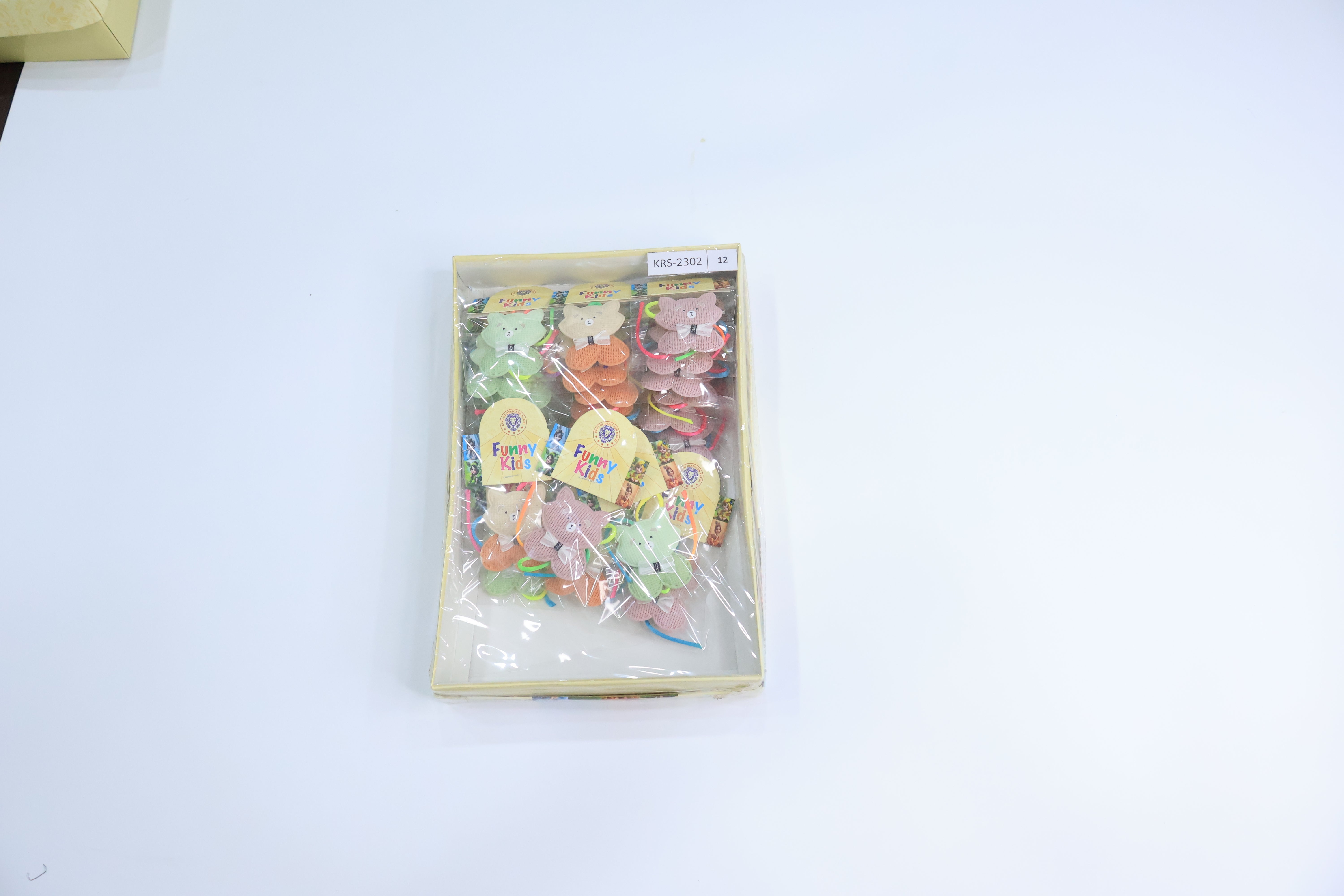 12 Pc Kids Rakhi Gift Pack â€“ Soft Pink Teddy Bear Rakhi with Bow Tie on Neon Thread, Fun Cartoon Box for Raksha Bandhan