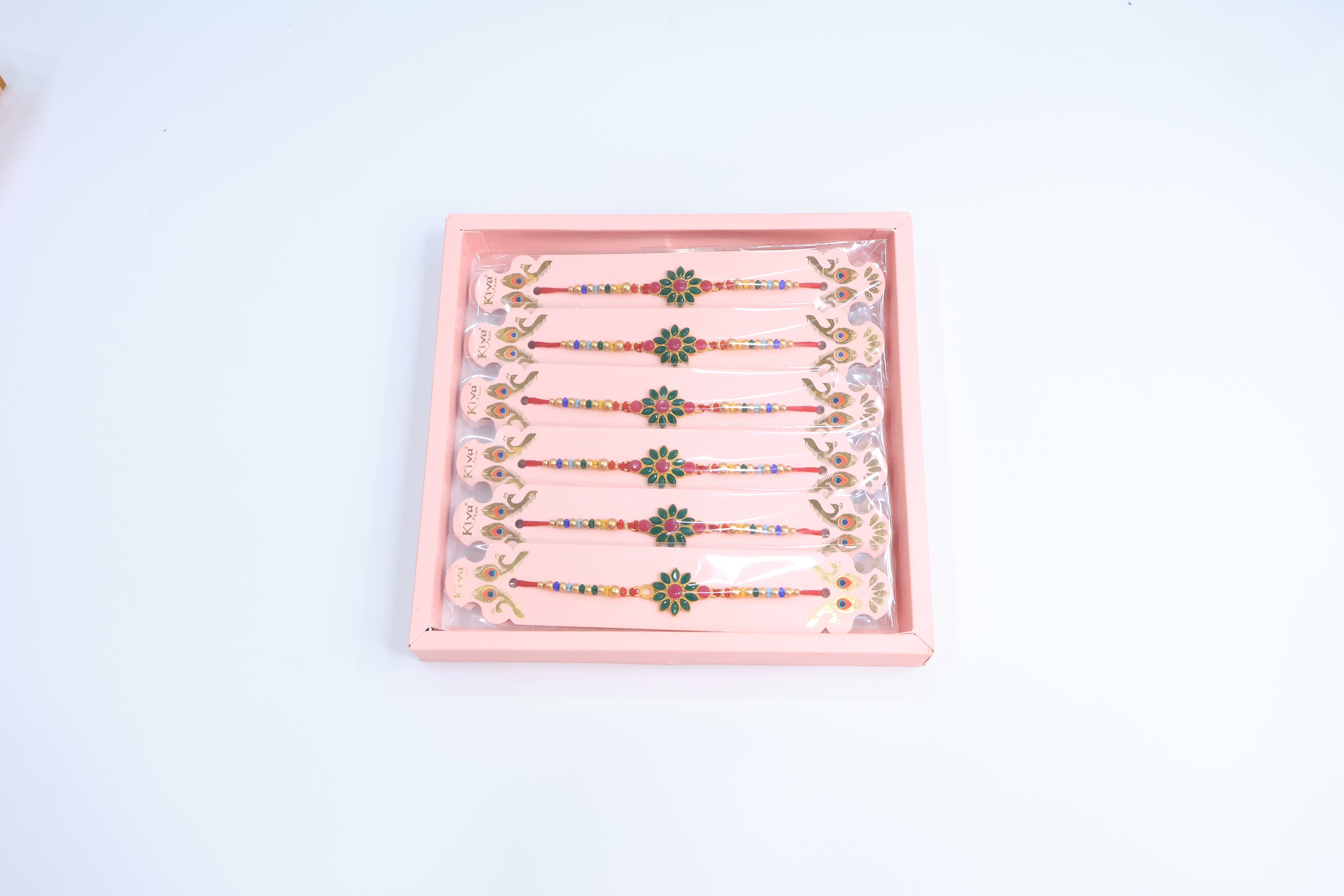 12 Pc Floral Stone Rakhi Set with Green & Pink Enamel Work and Multicolor Beads â€“ Traditional Designer Rakhi Gift Box for Raksha Bandhan