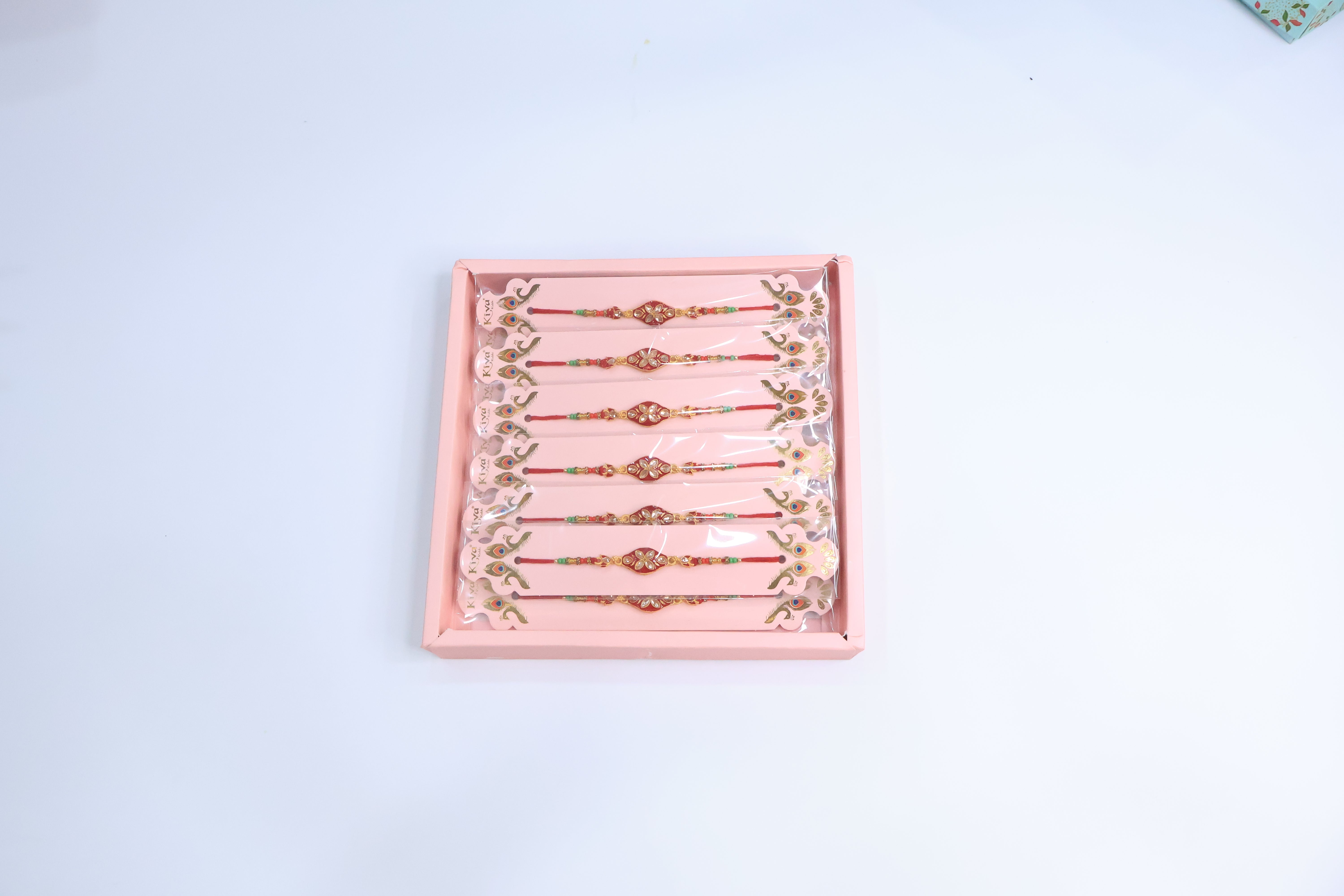 12 Pc Kundan Floral Rakhi Set with Red Enamel Work and Multicolor Beads â€“ Traditional Designer Rakhi Gift Box for Raksha Bandhan